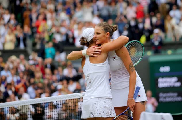Mandatory Credit: Photo by Shutterstock (12203623ak) Ashleigh Barty of Australia hugs Karolina Pliskova of Czech Republic Wimbledon Tennis Championships, Day 12, The All England Lawn Tennis and Croquet Club, London, UK - 10 Jul 2021 Wimbledon Tennis Championships, Day 12, The All England Lawn Tennis and Croquet Club, London, UK - 10 Jul 2021  Copyright: xShutterstockx 12203623ak