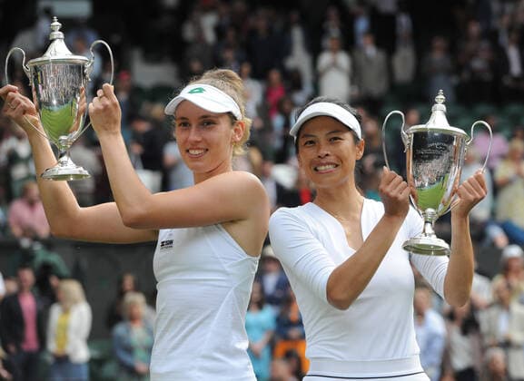 Lawn Tennis - 2021 All England Championships - Woman™s Doubles Final - Wimbledon Veronika Kudermetova and Elena Vesnina (Russia) v Su - Wei Hsieh and Elise Mertens Su - Wei Hsieh and Elise Mertens celebrate with their trophies 