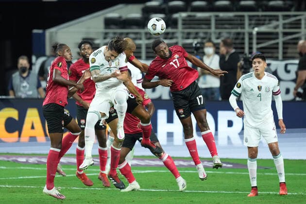 ARLINGTON, TX - JULY 10: Trinidad & Tobago defender Justin Garcia (17) battles with Mexico defender Carlos Salcedo (3) to head the ball in action during a CONCACAF Gold Cup group stage match between Mexico and Trinidad & Tobago on July 10, 2021 at AT&T Stadium in Arlington, TX. (Photo by Robin Alam Icon Sportswire) SOCCER: JUL 10 Concacaf Gold Cup - Mexico v Trinidad & Tobago Icon164210710004