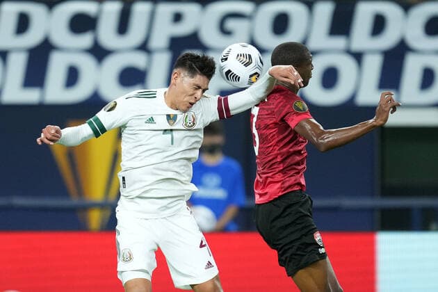 ARLINGTON, TX - JULY 10: Mexico defender Edson Alvarez (4) battles with Trinidad & Tobago midfielder Hashim Arcia (3) in action during a CONCACAF Gold Cup group stage match between Mexico and Trinidad & Tobago on July 10, 2021 at AT&T Stadium in Arlington, TX. (Photo by Robin Alam Icon Sportswire) SOCCER: JUL 10 Concacaf Gold Cup - Mexico v Trinidad & Tobago Icon164210710007
