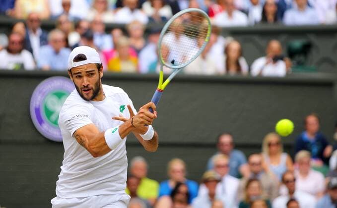 Mandatory Credit: Photo by Shutterstock (12204580g) Matteo Berrettini of Italy in action Wimbledon Tennis Championships, Day 13, The All England Lawn Tennis and Croquet Club, London, UK - 11 Jul 2021 Wimbledon Tennis Championships, Day 13, The All England Lawn Tennis and Croquet Club, London, UK - 11 Jul 2021  Copyright: xShutterstockx 12204580g