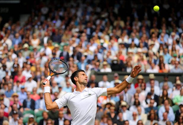 Mandatory Credit: Photo by Shutterstock (12204580u) Novak Djokovic of Serbia in action Wimbledon Tennis Championships, Day 13, The All England Lawn Tennis and Croquet Club, London, UK - 11 Jul 2021 Wimbledon Tennis Championships, Day 13, The All England Lawn Tennis and Croquet Club, London, UK - 11 Jul 2021  Copyright: xShutterstockx 12204580u