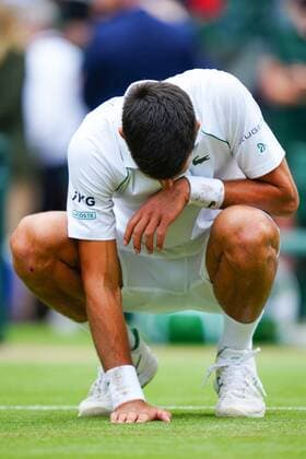 Mandatory Credit: Photo by Javier Garcia Shutterstock (12204578fr) Novak Djokovic celebrates victory in the Gentlemen s Singles final by eating some of the grass from the court Wimbledon Tennis Championships, Day 13, The All England Lawn Tennis and Croquet Club, London, UK - 11 Jul 2021 Wimbledon Tennis Championships, Day 13, The All England Lawn Tennis and Croquet Club, London, UK - 11 Jul 2021  Copyright: xJavierxGarcia Shutterstockx 12204578fr