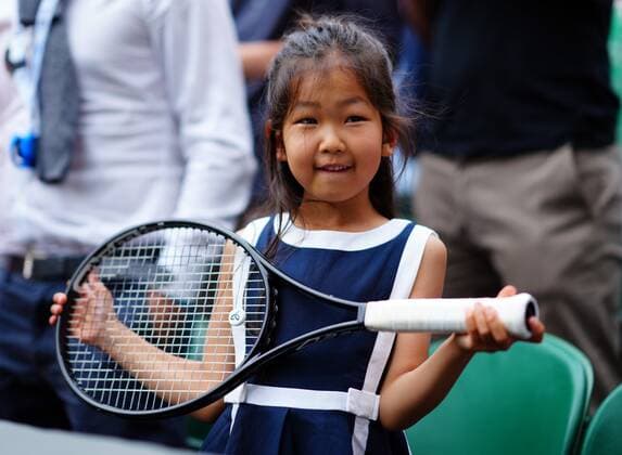 Mandatory Credit: Photo by Javier Garcia Shutterstock (12204578fv) Novak Djokovic hands his racquet to a young fan after victory in the Gentlemen s Singles final Wimbledon Tennis Championships, Day 13, The All England Lawn Tennis and Croquet Club, London, UK - 11 Jul 2021 Wimbledon Tennis Championships, Day 13, The All England Lawn Tennis and Croquet Club, London, UK - 11 Jul 2021  Copyright: xJavierxGarcia Shutterstockx 12204578fv