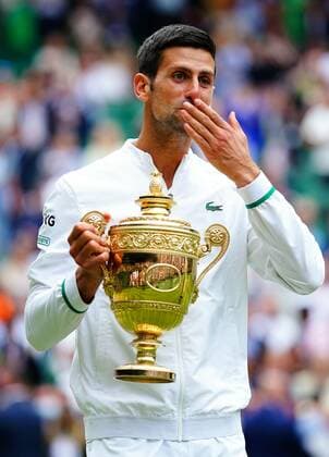 Mandatory Credit: Photo by Javier Garcia Shutterstock (12204578gv) Novak Djokovic celebrates with the trophy after victory in the Gentlemen s Singles final Wimbledon Tennis Championships, Day 13, The All England Lawn Tennis and Croquet Club, London, UK - 11 Jul 2021 Wimbledon Tennis Championships, Day 13, The All England Lawn Tennis and Croquet Club, London, UK - 11 Jul 2021  Copyright: xJavierxGarcia Shutterstockx 12204578gv