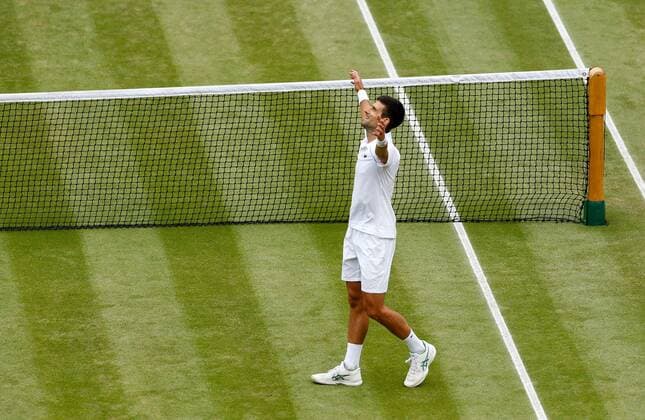 Mandatory Credit: Photo by Shutterstock (12204580ah) Novak Djokovic of Serbia celebrates on match point Wimbledon Tennis Championships, Day 13, The All England Lawn Tennis and Croquet Club, London, UK - 11 Jul 2021 Wimbledon Tennis Championships, Day 13, The All England Lawn Tennis and Croquet Club, London, UK - 11 Jul 2021  Copyright: xShutterstockx 12204580ah
