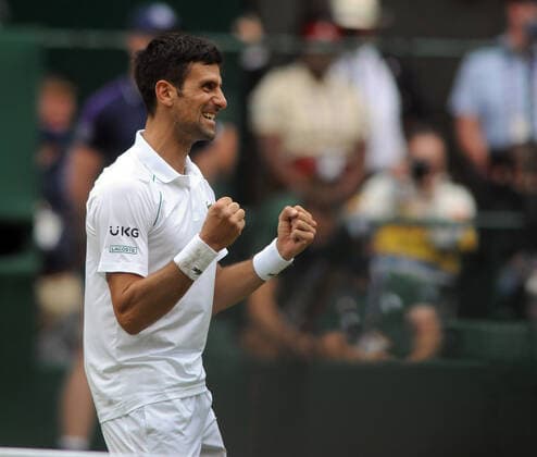 Lawn Tennis - 2021 All England Championships - Men™s Final Sunday - Wimbledon - Novak Djokovic v Matteo Berrettini on Centre Court Novak Djokovic celebrates winning match point 