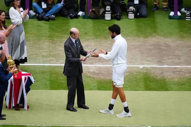 Mandatory Credit: Photo by Shutterstock (12204579fi) Novak Djokovic is presented with the trophy by The Duke of Kent after victory in the Gentlemen s Singles final Wimbledon Tennis Championships, Day 13, The All England Lawn Tennis and Croquet Club, London, UK - 11 Jul 2021 Wimbledon Tennis Championships, Day 13, The All England Lawn Tennis and Croquet Club, London, UK - 11 Jul 2021  Copyright: xShutterstockx 12204579fi