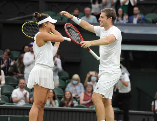 Lawn Tennis - 2021 All England Championships - Men™s Final Sunday - Wimbledon - Mixed Doubles Final on Centre Court. Neal Skupski and Desirae Krawczyk v Joe Salisbury and Harriet Dart Neal Skupski and Desirae Krawczyk celebrate after winning match point. 