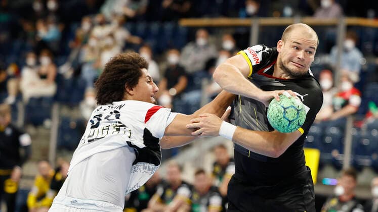 11 07 2021, Handball, Three Nations Tournament 2021, Germany Egypt, GER, Nuremberg, Arena Nuernberger Versicherung Picture from left Ali Zein Egypt and Paul Drux German National Team Copyright: HMBxMedia xHeikoxBecker