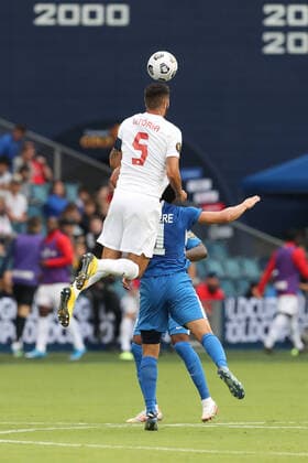 KANSAS CITY, KS - Jul 11: Canada defender Steven Vitoria (5) goes high for a header in the first half of a Concacaf Gold Cup match between Canada and Martinique on Jul 11, 2021 at Children s Mercy Park in Kansas City, KS. (Photo by Scott Winters Icon Sportswire) SOCCER: JUL 11 Concacaf Gold Cup - Canada v Martinique Icon2107110086