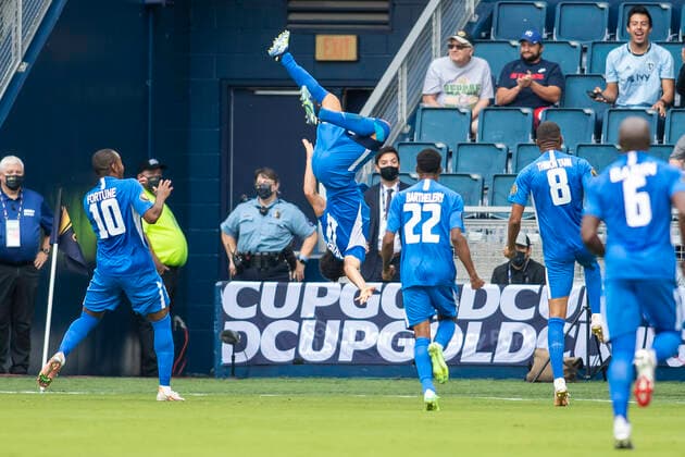KANSAS CITY, KS - JULY 11: Martinique forward Emmanuel Riviere (11) does a back flip after scoring the opening goal during the CONCACAF Gold Cup match between Canada and Martinique on Sunday, July 11, 2021 at Children™s Mercy park in Kansas City, KS. (Photo by Nick Tre. Smith Icon Sportswire) SOCCER: JUL 11 Concacaf Gold Cup - Canada v Martinique Icon2107110019