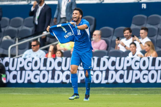 KANSAS CITY, KS - JULY 11: Martinique forward Emmanuel Riviere (11) holds up a shirt after scoring the opening goal during the CONCACAF Gold Cup match between Canada and Martinique on Sunday, July 11, 2021 at Children™s Mercy park in Kansas City, KS. (Photo by Nick Tre. Smith Icon Sportswire) SOCCER: JUL 11 Concacaf Gold Cup - Canada v Martinique Icon2107110020