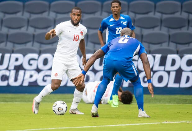 KANSAS CITY, KS - JULY 11: Canada forward Junior Hoilett (10) attempts to maneuver past a defender during the CONCACAF Gold Cup match between Canada and Martinique on Sunday, July 11, 2021 at Children™s Mercy park in Kansas City, KS. (Photo by Nick Tre. Smith Icon Sportswire) SOCCER: JUL 11 Concacaf Gold Cup - Canada v Martinique Icon2107110043