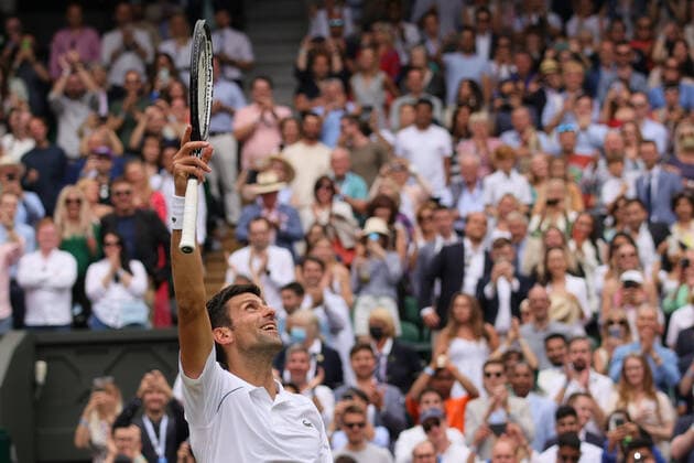 (210712) -- LONDON, July 12, 2021 -- Novak Djokovic of Serbia celebrates after winning the men s final match between Novak Djokovic of Serbia and Matteo Berrettini of Italy at Wimbledon tennis Championship in London, Britain, on July 11, 2021. (Photo by Xinhua) (SP)BRITAIN-LONDON-TENNIS-WIMBLEDON-MEN S FINAL TimxIreland 
