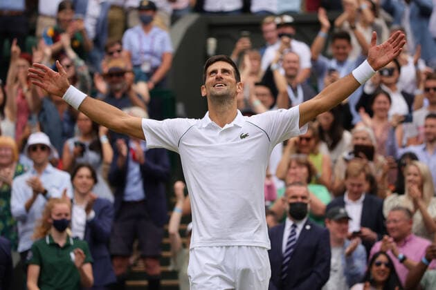 (210712) -- LONDON, July 12, 2021 -- Novak Djokovic of Serbia celebrates after winning the men s final match between Novak Djokovic of Serbia and Matteo Berrettini of Italy at Wimbledon tennis Championship in London, Britain, on July 11, 2021. (Photo by Xinhua) (SP)BRITAIN-LONDON-TENNIS-WIMBLEDON-MEN S FINAL TimxIreland 