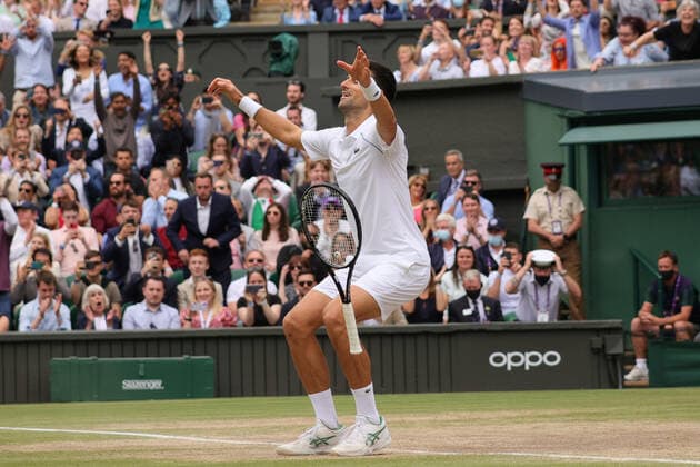 (210712) -- LONDON, July 12, 2021 -- Novak Djokovic of Serbia celebrates after winning the men s final match between Novak Djokovic of Serbia and Matteo Berrettini of Italy at Wimbledon tennis Championship in London, Britain, on July 11, 2021. (Photo by Xinhua) (SP)BRITAIN-LONDON-TENNIS-WIMBLEDON-MEN S FINAL TimxIreland 