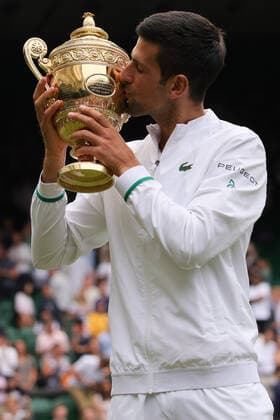 (210712) -- LONDON, July 12, 2021 -- Novak Djokovic of Serbia celebrates with the trophy after winning the men s final match between Novak Djokovic of Serbia and Matteo Berrettini of Italy at Wimbledon tennis Championship in London, Britain, on July 11, 2021. (Photo by Xinhua) (SP)BRITAIN-LONDON-TENNIS-WIMBLEDON-MEN S FINAL TimxIreland 