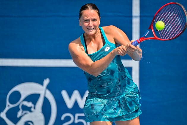 Viktoria Kuzmova of Slovakia plays a return to Mona Barthel of Germany during the Livesport Prague Open WTA, Tennis Damen women’s tennis tournament in Prague, Czech Republic, July 13, 2021. (CTKxPhoto VitxSimanek) CTKPhotoP2021071303440  VIS 005