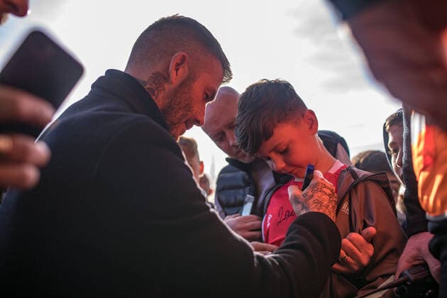 Mandatory Credit: Photo by James Speakman Mercury Press Shutterstock (10108642al) David Beckham signs a young Salford City fan s shirt on his arrival to the stadium. Salford City FC vs Dover Athletic, Vanarama National League, Football, The Peninsula Stadium, Salford, Greater Manchester, United Kingdom - 16 Feb 2019 Editorial use only Salford City FC vs Dover Athletic, Vanarama National League, Football, The Peninsula Stadium, Salford, Greater Manchester, United Kingdom - 16 Feb 2019 Editorial use only Copyright: xJamesxSpeakman MercuryxPress Shutterstockx 10108642al