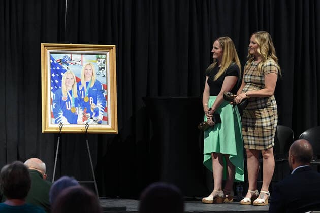 July 14, 2021: North Dakota Governor Doug Burgum presents the state s highest honor, the Theodore Roosevelt Rough Rider Award to olympic gold medalists Monique Lamoureux-Morando (left) and twin sister Jocelyne Lamoureux-Davidson (right) during a ceremony at the Ralph Engelstad Arena, Grand Forks, ND. CSM St. Paul USA - ZUMAc04_ 20210714_zaf_c04_003 Copyright: xRussellxHonsx