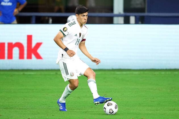 ARLINGTON, TX - JULY 10: Mexico midfielder Erick Gutierrez (14) dribbles the ball in action during a CONCACAF Gold Cup group stage match between Mexico and Trinidad & Tobago on July 10, 2021 at AT&T Stadium in Arlington, TX. (Photo by Robin Alam Icon Sportswire) SOCCER: JUL 10 Concacaf Gold Cup - Mexico v Trinidad & Tobago Icon164210710162