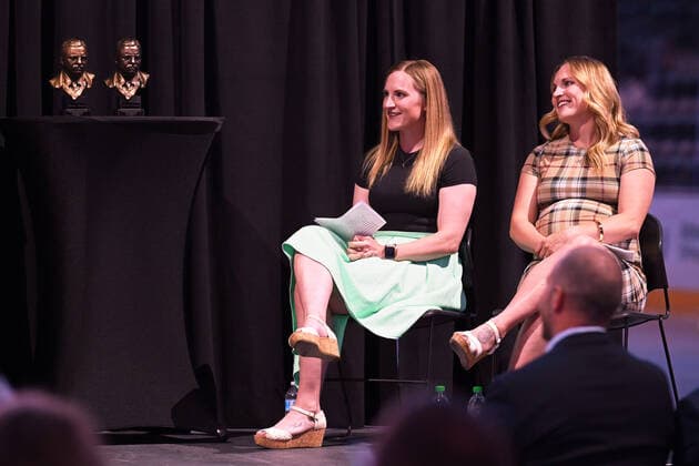July 14, 2021: Olympic gold medalists Monique Lamoureux-Morando (left) and twin sister Jocelyne Lamoureux-Davidson (right) listen to a speaker before North Dakota Governor Doug Burgum presents them with the state s highest honor, the Theodore Roosevelt Rough Rider Award during a ceremony at the Ralph Engelstad Arena, Grand Forks, ND. CSM Grand Forks USA - ZUMAc04_ 20210714_zaf_c04_014 Copyright: xRussellxHonsx