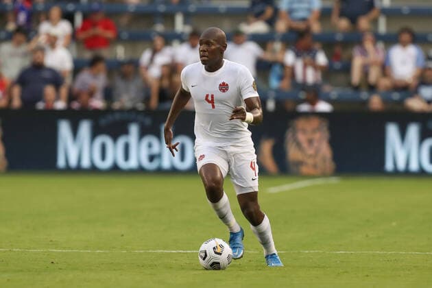 KANSAS CITY, KS - Jul 11: Canada defender Kamal Miller (4) with the ball in the second half of a Concacaf Gold Cup match between Canada and Martinique on Jul 11, 2021 at Children s Mercy Park in Kansas City, KS. (Photo by Scott Winters Icon Sportswire) SOCCER: JUL 11 Concacaf Gold Cup - Canada v Martinique Icon2107110177