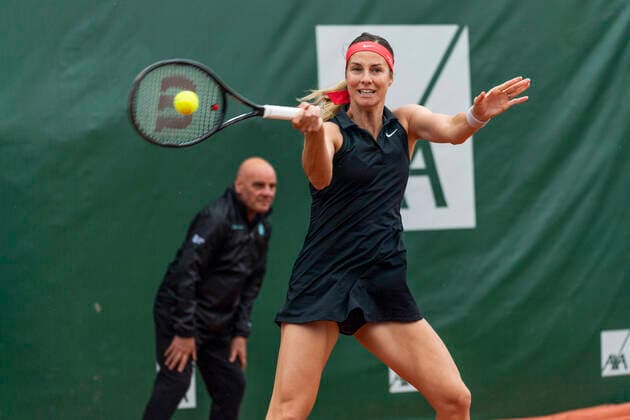 Switzerland: 8th final Lausanne 2021 WTA, Tennis Damen 250 tennis tournament and the disturbance of the rain Lausanne Switzerland, 07 15 2021: Mandy Minella of Luxembourg is in action during the 8th final, Lausanne 2021 tennis tournament WTA 250 Lausanne Switzerland Copyright: EricxDubost