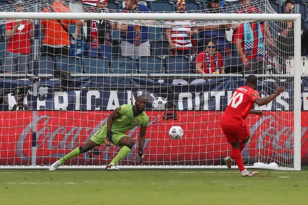KANSAS CITY, KS - JULY 15: Canada forward David Junior Hoilett (10) scores on a penalty kick against Haiti goalkeeper Brian Sylvestre (1) in the second half of a Concacaf Gold Cup match between Haiti and Canada on Jul 15, 2021 at Children s Mercy Park in Kansas City, KS. (Photo by Scott Winters Icon Sportswire) SOCCER: JUL 15 Concacaf Gold Cup - Haiti v Canada Icon2107150203