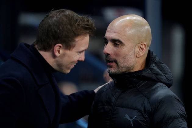 Mandatory Credit: Photo by Paul Currie BPI Shutterstock (10031551q) Hoffenheim manager Julian Nagelsmann and Pep Guardiola manager of Manchester City Manchester City v Hoffenheim, UEFA Champions League Group F, Football, Etihad Stadium, Manchester - 12 Dec 2018 Manchester City v Hoffenheim, UEFA Champions League Group F, Football, Etihad Stadium, Manchester - 12 Dec 2018  Copyright: xPaulxCurrie BPI Shutterstockx 10031551q