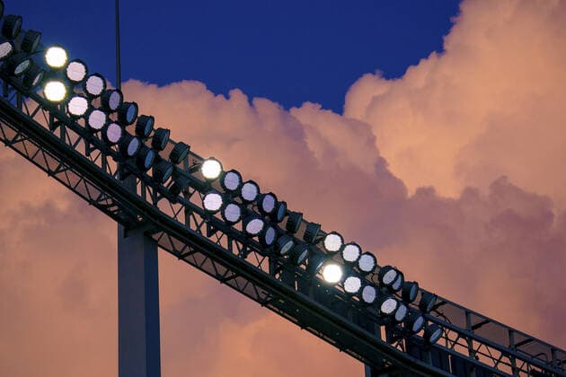 Sport Bilder des Tages Clouds light up the stadium as the Baltimore Orioles take on the Kansas City Royals at Kaufman Stadium in Kansas City, Missouri on Friday, July 16, 2021.  KCP20210716122 KYLExRIVAS