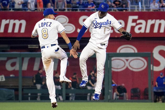 Kansas City Royals second baseman Nicky Lopez (8) and center fielder Jarrod Dyson (1) celebrate the victory over the Baltimore Orioles at Kaufman Stadium in Kansas City, Missouri on Friday, July 16, 2021.  KCP202107161XX5 KYLExRIVAS