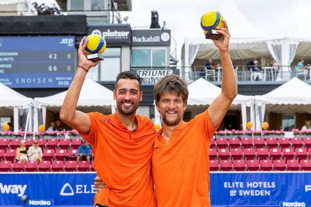 210718 Sander Arends, Netherlands, and David Pel, Netherlands, cheer for trophies after winning the doubles final on day 14 of the Nordea Open on 18 July 2021 in Bastad,  Copyright: MATHILDAxAHLBERG BB210718BB343