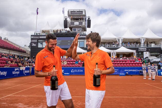 210718 Sander Arends, Netherlands, and David Pel, Netherlands, rejoice after winning the doubles final on day 14 of the Nordea Open on 18 July 2021 in Bastad,  Copyright: MATHILDAxAHLBERG BB210718BB347
