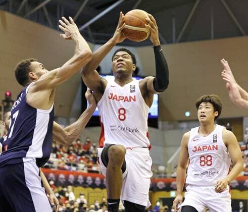 Basketball: Japan-France warm-up match before Olympics Rui Hachimura (C) of Japan plays during the fourth quarter of a warm-up match against France ahead of the Tokyo Olympics, at Saiden Chemical Arena in Saitama, eastern Japan, on July 18, 2021. (Pool photo)  A14AA0000753122P