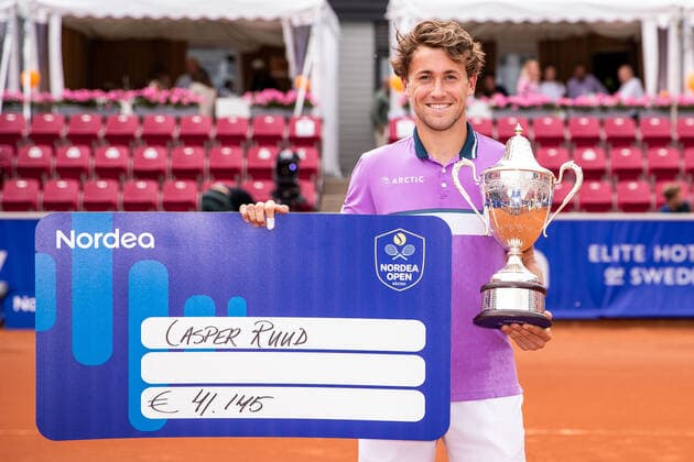 210718 Casper Ruud, Norway, with trophy and prize check after winning the singles final on day 14 of the Nordea Open on July 18, 2021 in Bastad,  Copyright: MATHILDAxAHLBERG BB210718BB554