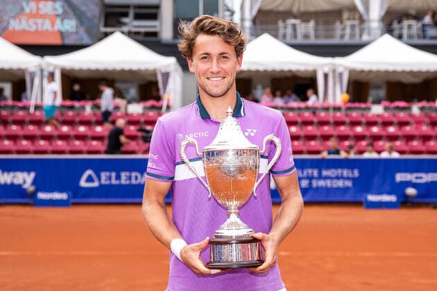 210718 Casper Ruud, Norway, cheers with Mr G Tro s Trophy after winning the singles final on day 14 of the Nordea Open on 18 July 2021 in Bastad,  Copyright: MATHILDAxAHLBERG BB210718BB555