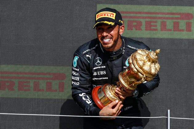 HAMILTON Lewis (gbr), Mercedes AMG F1 GP W12 E Performance, portrait celebrating his victory at the podium with the trophy during the Formula 1 Pirelli British Grand Prix 2021, 10th round of the 2021 FIA Formula One World Championship, WM, Weltmeisterschaft from July 16 to 18, 2021 on the Silverstone Circuit, in Silverstone, United Kingdom - FORMULE 1 : Grand prix de Grande Bretagne - Course - Silverstone - 18 07 2021 DPPI PANORAMIC  00121021__B2_9915