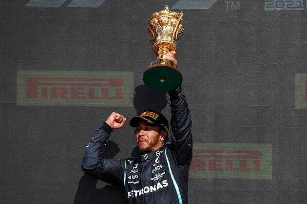 HAMILTON Lewis (gbr), Mercedes AMG F1 GP W12 E Performance, portrait celebrating his victory at the podium with the trophy during the Formula 1 Pirelli British Grand Prix 2021, 10th round of the 2021 FIA Formula One World Championship, WM, Weltmeisterschaft from July 16 to 18, 2021 on the Silverstone Circuit, in Silverstone, United Kingdom - FORMULE 1 : Grand prix de Grande Bretagne - Course - Silverstone - 18 07 2021 DPPI PANORAMIC  00121021__B2_9938