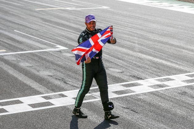 FORMULA 1 BRITISH GRAND PRIX, 18 07 2021 Silverstone Circuit,18 July 2021 Lewis Hamilton (GBR), Mercedes AMG Petronas W12 celebrates winning with a Union Jack flag on track in front of fans at the FORMULA 1 PIRELLI BRITISH GRAND PRIX RACE at Silverstone, United Kingdom Editorial Use Only Copyright: xPhilxDuncanx ESM-0061-0009