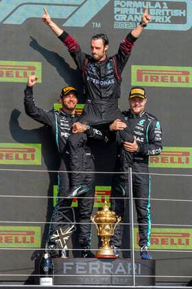 18th July 2021; Silverstone Circuit, Silverstone, Northamptonshire, England; Formula One British Grand Prix, Race Day; The Mercedes AMG Petronas F1 Team team celebrate the win for Lewis Hamilton and third for Valtteri Bottas  ActionPlus12307248 TimxWilliams