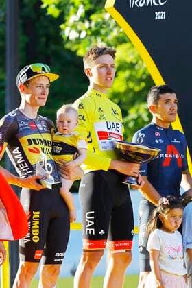 PARIS, FRANCE - JULY 18 : VINGEGAARD Jonas (DEN) of JUMBO-VISMA, POGACAR Tadej (SLO) of UAE TEAM EMIRATES and CARAPAZ Richard (ECU) of INEOS GRENADIERS podium during stage 21 of the 108th edition of the 2021 Tour de France cycling race, the stage of 108,4 kms between Chatou and finish at the Champs Elysees in Paris. on July 18, 2021 in Paris, France, 18 07 2021 CYCLISME : Tour de France 2021 - Etape 21 - Chatou to Champs Elysees - 18 07 2021 PHOTONEWS PANORAMIC 