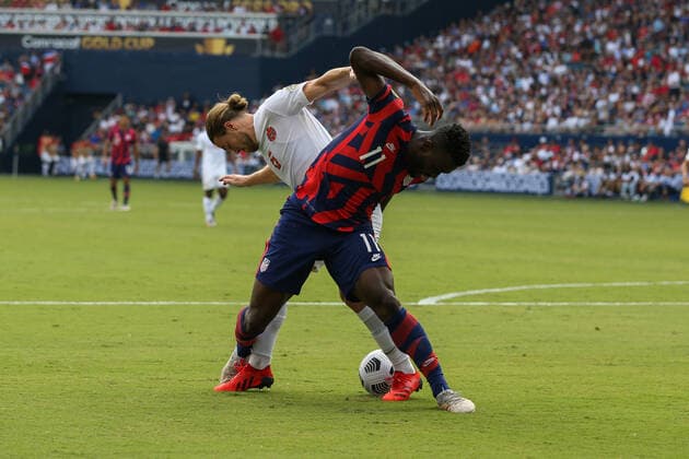 KANSAS CITY, KS - JULY 18: United States forward Daryl Dike (11) and Canada midfielder Samuel Piette (6) get tangled up in the box in the first half of a Concacaf Gold Cup match between Canada and the United States on Jul 18, 2021 at Children s Mercy Park in Kansas City, KS. (Photo by Scott Winters Icon Sportswire) SOCCER: JUL 18 Concacaf Gold Cup - USA v Canada Icon2107180160