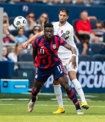 KANSAS CITY, KS - JULY 18: United States forward Daryl Dike (11) shields away Canada defender Steven Vitoria (5) during the group B final match between the United States and Canada on Sunday July 18, 2021 at Children™s Mercy Park in Kansas City, KS. (Photo by Nick Tre. Smith Icon Sportswire) SOCCER: JUL 18 Concacaf Gold Cup - USA v Canada Icon2107180054
