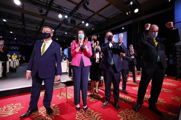 (210721) -- TOKYO, July 21, 2021 -- Members of the Brisbane 2032 delegation celebrate after Brisbane was announced as the 2032 Summer Olympics host city during the 138th International Olympic Committee (IOC) Session in Tokyo, Japan, on July 21, 2021. ( Pool via Xinhua) (SP)TOKYO-JAPAN-IOC-138TH SESSION ToruxHanai 