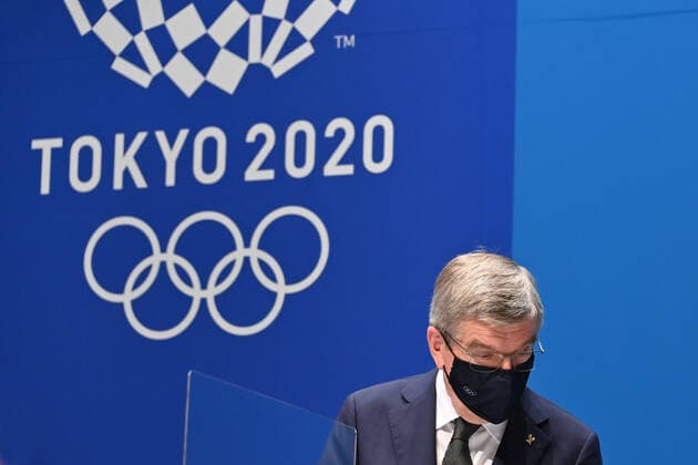 IOC President Dr Thomas BACH in front of the Tokyo 2020 logo and Olympic rings Wearing Masks,Mask Single Image,Cropped Single Image,Portrait,Portrait,IOC Press Conference on 21 07 2021 Summer Olympics 2020, from 23 07 08 2021 in Tokyo Japan Â