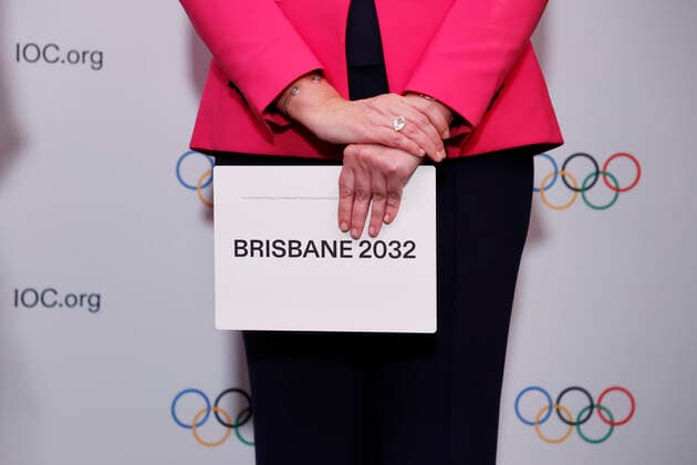 (210721) -- TOKYO, July 21, 2021 -- The Honourable Annastacia Palaszczuk MP, Premier of Queensland and Minister for Trade, holds the queue card after Brisbane was announced as the 2032 Summer Olympics host city during the 138th International Olympic Committee (IOC) Session in Tokyo, Japan, on July 21, 2021. ( Pool via Xinhua) (SP)TOKYO-JAPAN-IOC-138TH SESSION ToruxHanai 