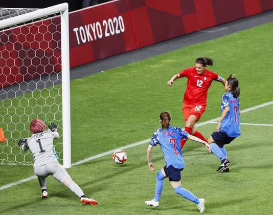 Tokyo Olympics: Football Christine Sinclair (12) scores during the first half of Canada s Group E match of the Tokyo Olympic women s football tournament against Japan on July 21, 2021, at Sapporo Dome in northern Japan.  A14AA0000753340P