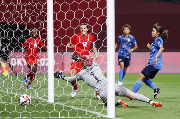 Tokyo Olympics: Football Christine Sinclair (12) scores during the first half of Canada s Group E match of the Tokyo Olympic women s football tournament against Japan on July 21, 2021, at Sapporo Dome in northern Japan.  A14AA0000753341P